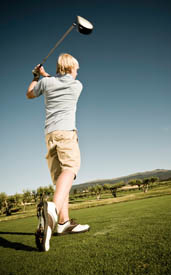 A man golfing